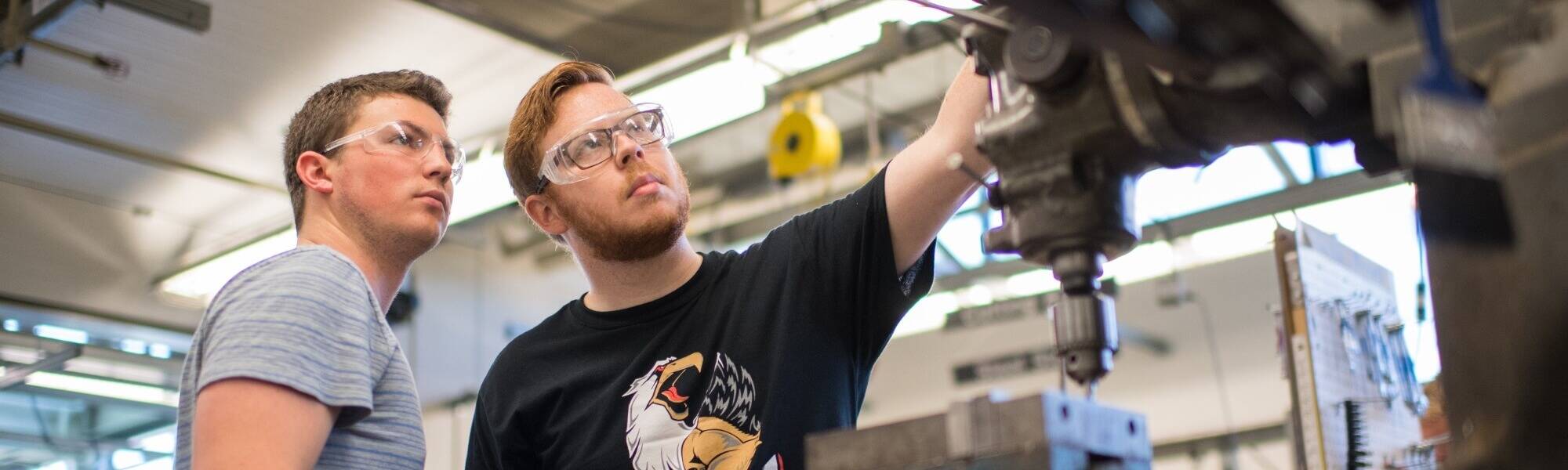Students working with machine